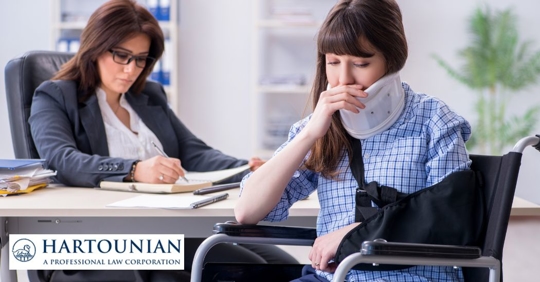 injured woman talking to a lawyer